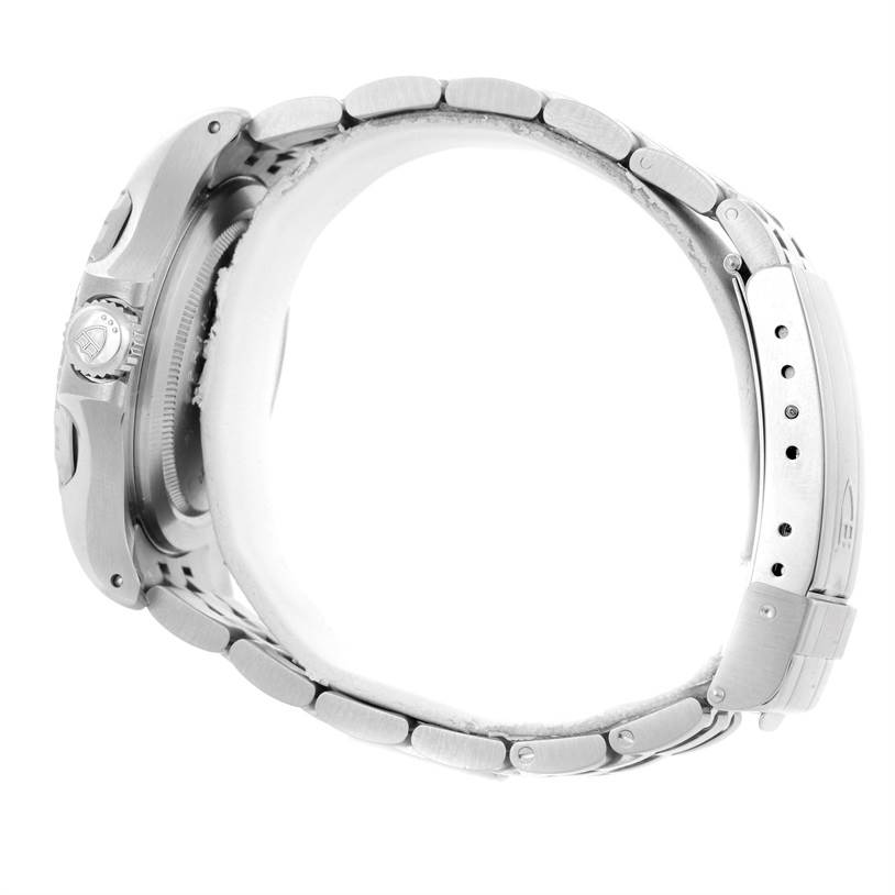 This image shows a Tudor Hydronaut 89190 Men
s Stainless Steel Yellow Dial 89190 Men
s Stainless Steel Yellow Dial watch from the side, highlighting the case, crown, and metal bracelet.