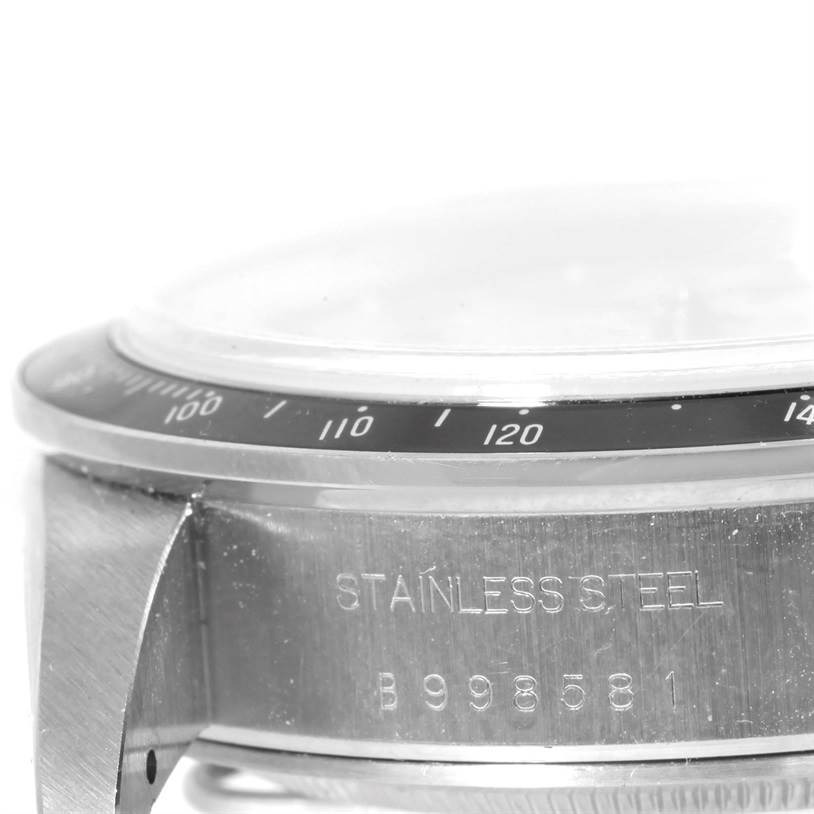 This close-up angle of the Tudor Prince watch showcases the bezel, crystal, and stainless steel case with a visible serial number.