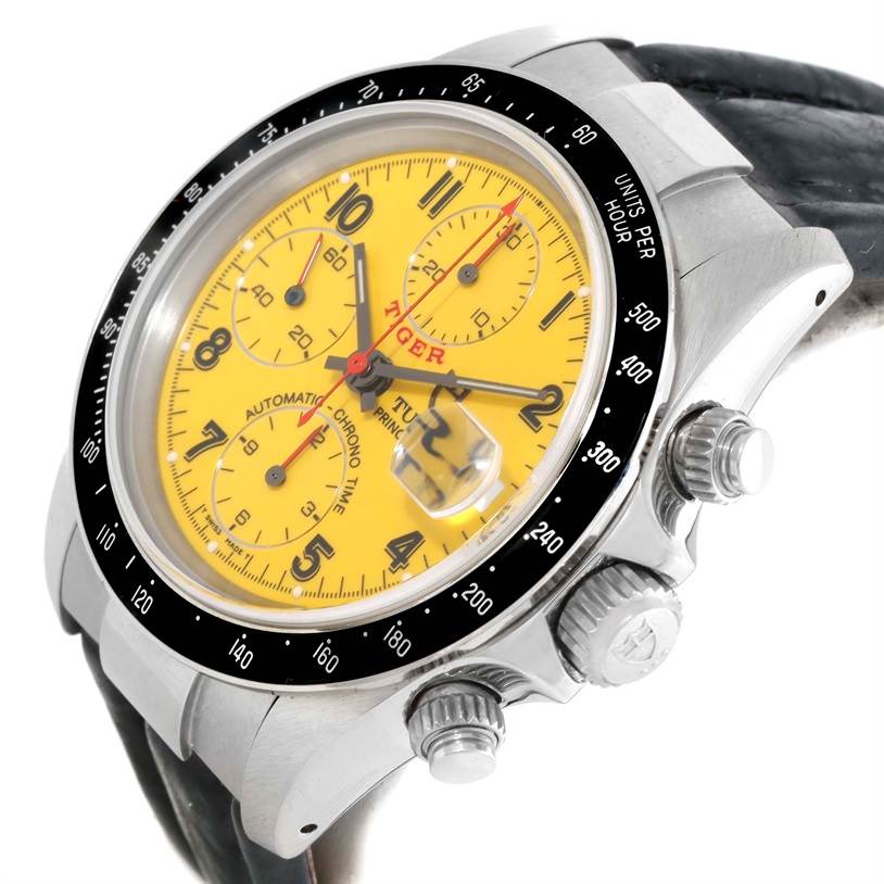 The image shows a close-up, angled view of a Tudor Prince watch, highlighting the yellow dial, chronograph sub-dials, and crown.