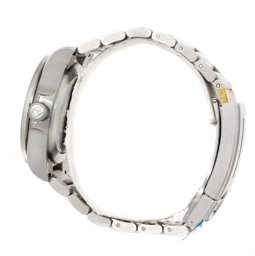 The image shows a side profile of the Tudor Pelagos 25500TN Men's Titanium Black Dial 25500TN Men's Titanium Black Dial watch, highlighting the case, crown, and metal bracelet.