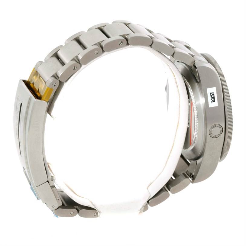 This side view of the Tudor Pelagos 25500TN Men's Titanium Black Dial 25500TN Men's Titanium Black Dial watch shows its metal bracelet and clasp, along with part of the case and crown.