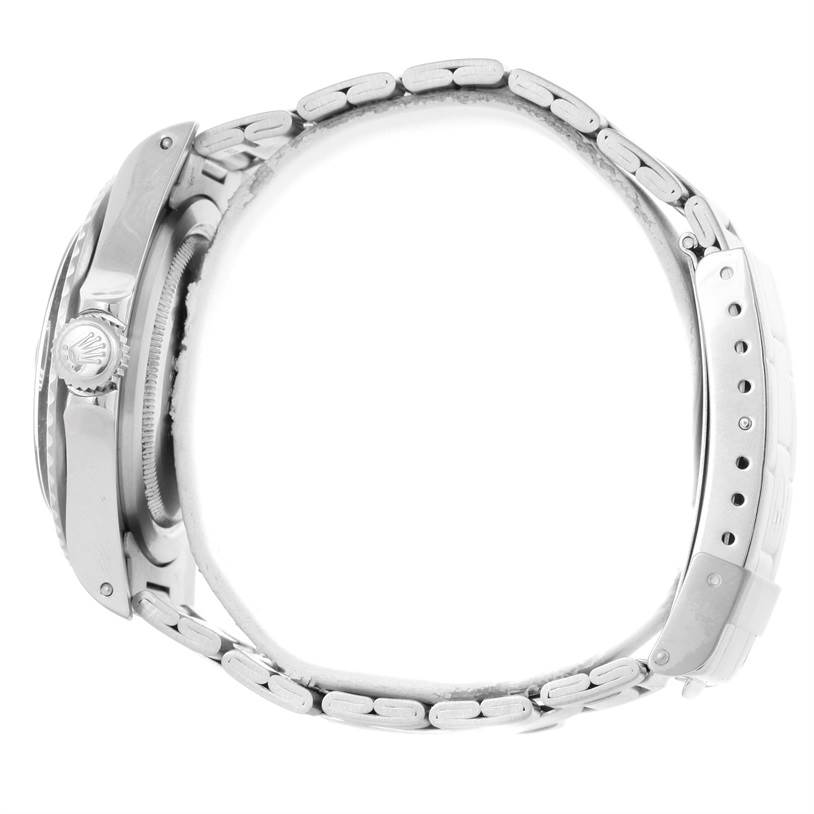 This image shows a side profile of the Tudor Submariner 79090 Men's Stainless Steel Black Dial 79090 Men's Stainless Steel Black Dial watch, highlighting the crown and bracelet links.