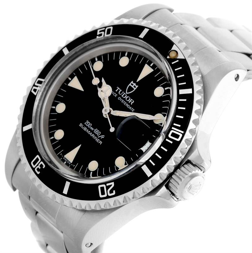 The image shows a close-up angled view of the Tudor Submariner 79090 Men's Stainless Steel Black Dial 79090 Men's Stainless Steel Black Dial watch, highlighting its bezel, dial, crown, and part of the bracelet.