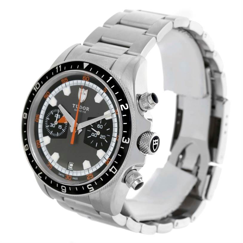 The Tudor Heritage Chrono 70330N-95740 Men's Stainless Steel Grey Dial 70330N-95740 Men's Stainless Steel Grey Dial watch is shown from an angle displaying the face, bezel, pushers, and part of the metal bracelet.