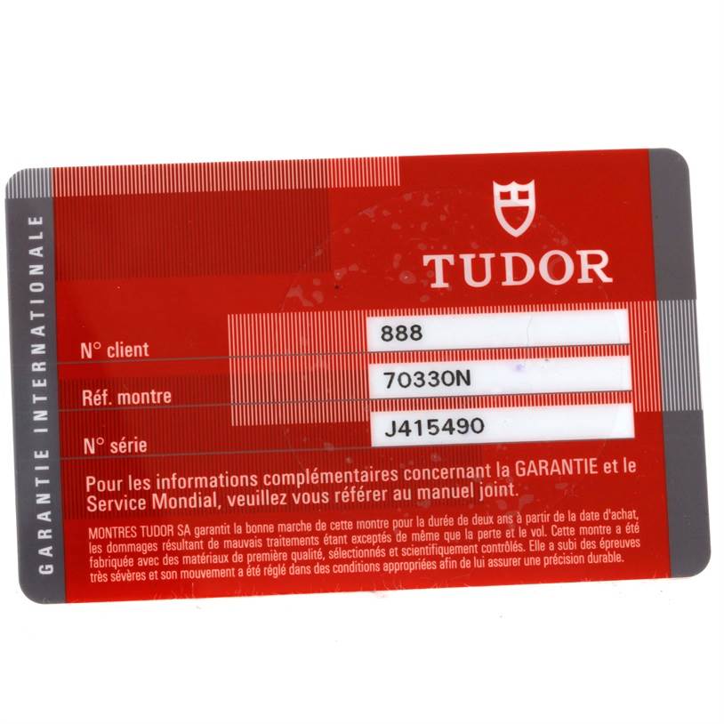 The image shows the warranty card for the Tudor Heritage Chrono 70330N-95740 Men's Stainless Steel Grey Dial 70330N-95740 Men's Stainless Steel Grey Dial model, displaying the client number, watch reference, and serial number.