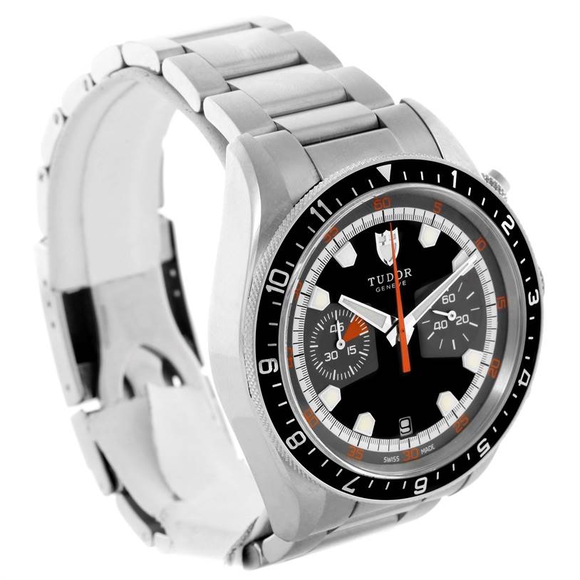 The image shows a Tudor Heritage Chrono 70330N-95740 Men's Stainless Steel Black Dial 70330N-95740 Men's Stainless Steel Black Dial watch at an angle highlighting its face and metal bracelet.