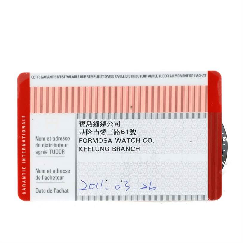 The image shows the warranty card for a Tudor Heritage Chrono 70330N-95740 Men's Stainless Steel Black Dial 70330N-95740 Men's Stainless Steel Black Dial watch.