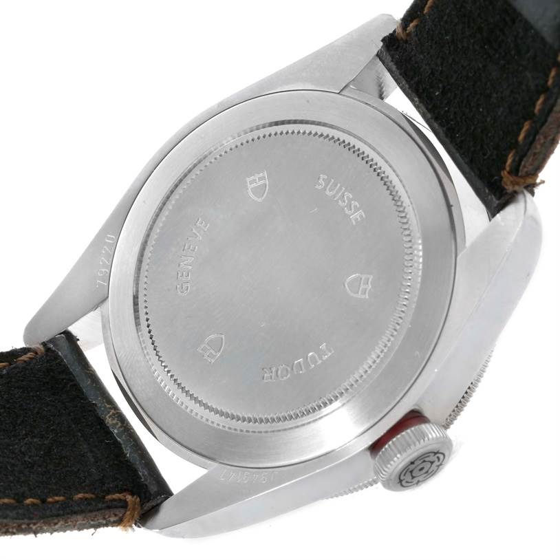 The image shows the back case and strap of a Tudor Heritage Black Bay 79220R Men's Stainless Steel Black Dial 79220R Men's Stainless Steel Black Dial watch at an angle.