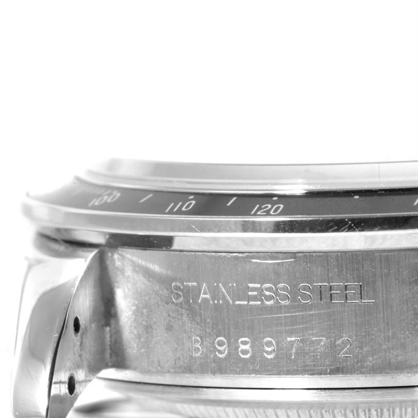 The image shows a close-up side view of the case and part of the bezel of the Tudor Prince watch, displaying engraving details.