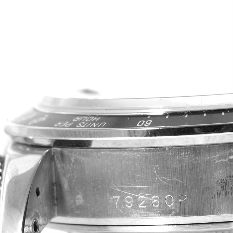 The image shows a close-up side view of a Tudor Prince model, focusing on the case with engravings and a portion of the bezel.