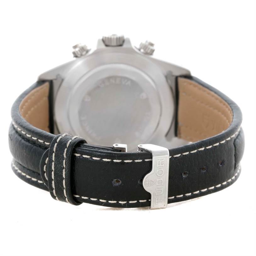 This image shows the back of a Tudor Tiger 79273 Men's Stainless Steel White Dial 79273 Men's Stainless Steel White Dial model watch, including the strap and clasp with the Tudor logo.