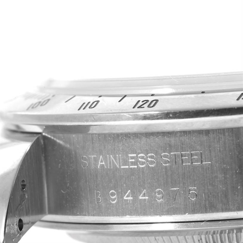 The image shows a side view of the Tudor Tiger 79273 Men's Stainless Steel White Dial 79273 Men's Stainless Steel White Dial model watch case, revealing the stainless steel material and the engravings.