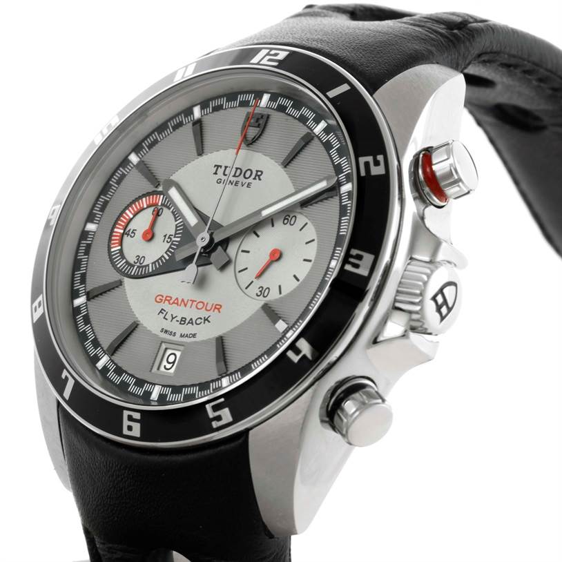 The image shows a close-up, angled side view of the Tudor Grantour 20550N Men's Stainless Steel Grey Dial 20550N Men's Stainless Steel Grey Dial watch, featuring its face, bezel, crown, and pushers.