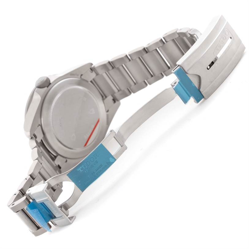 The image shows the underside and clasp of a Tudor Pelagos 25500TN Men's Titanium Black Dial 25500TN Men's Titanium Black Dial watch with its bracelet partially open.