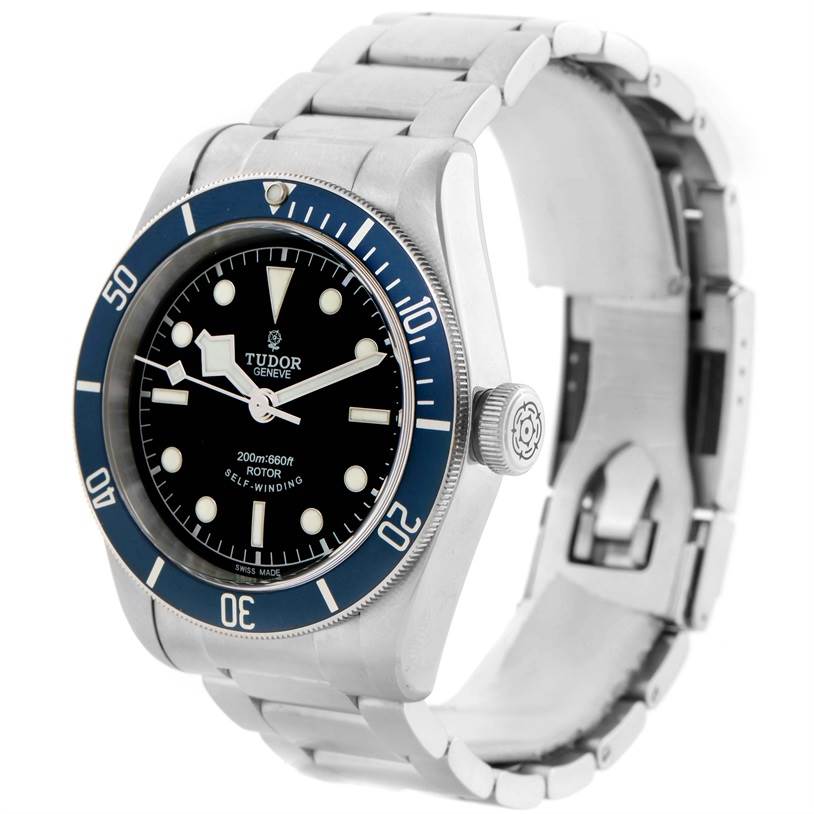 The image shows the Tudor Heritage Black Bay 79220 Men's Stainless Steel Black Dial 79220 Men's Stainless Steel Black Dial watch at a front-right angle, displaying the face, bezel, crown, and part of the bracelet.