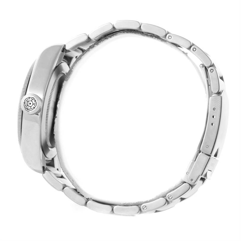 The image shows a side view of the Tudor Heritage Black Bay 79220 Men's Stainless Steel Black Dial 79220 Men's Stainless Steel Black Dial watch, highlighting the case, crown, and metal bracelet.