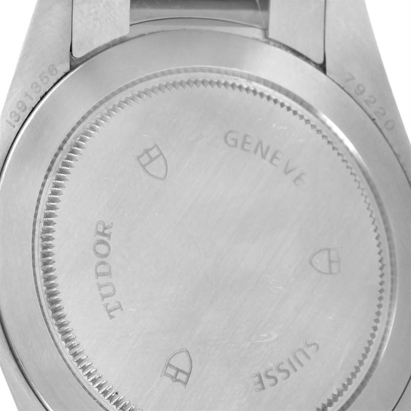 The image shows the case back of a Tudor Heritage Black Bay 79220 Men's Stainless Steel Black Dial 79220 Men's Stainless Steel Black Dial watch.