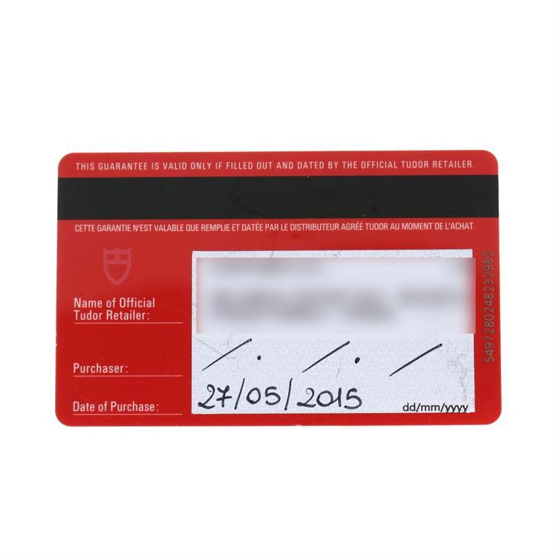 The image shows a warranty card for the Tudor Heritage Black Bay 79220 Men's Stainless Steel Black Dial 79220 Men's Stainless Steel Black Dial watch model, displaying purchase date and retailer information.