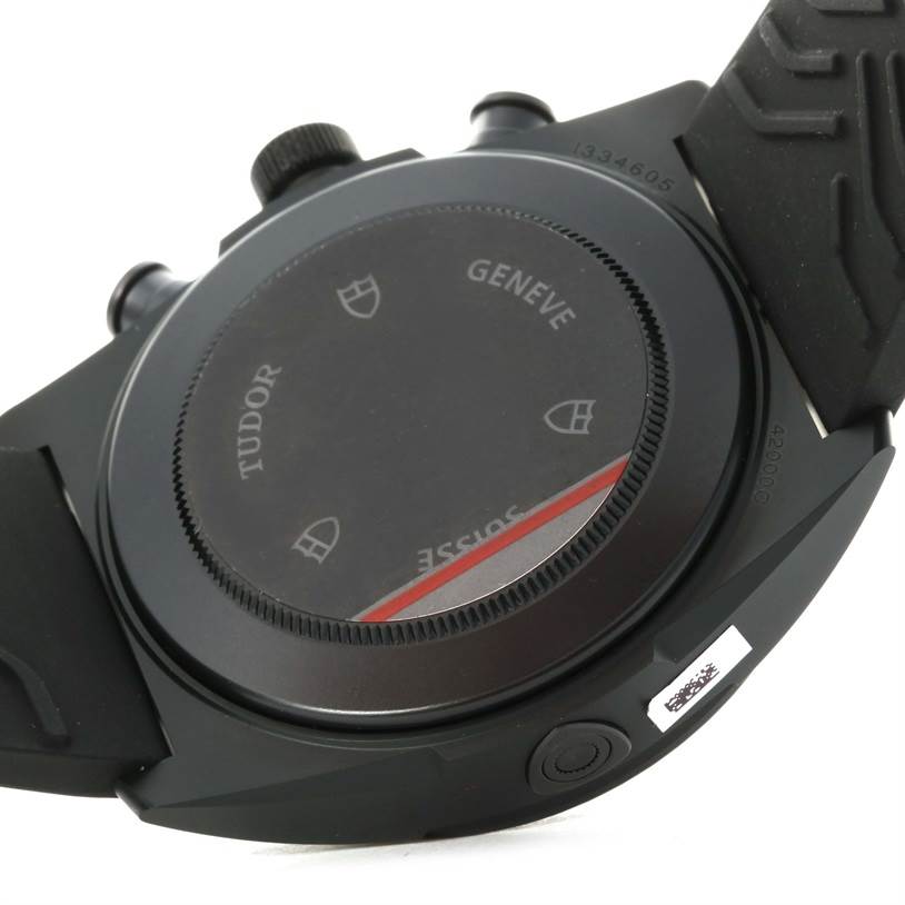 The image shows the back case of the Tudor Fastrider 42000CR Men's Stainless Steel Black Dial 42000CR Men's Stainless Steel Black Dial watch, viewed at an angle highlighting the case back and part of the strap.