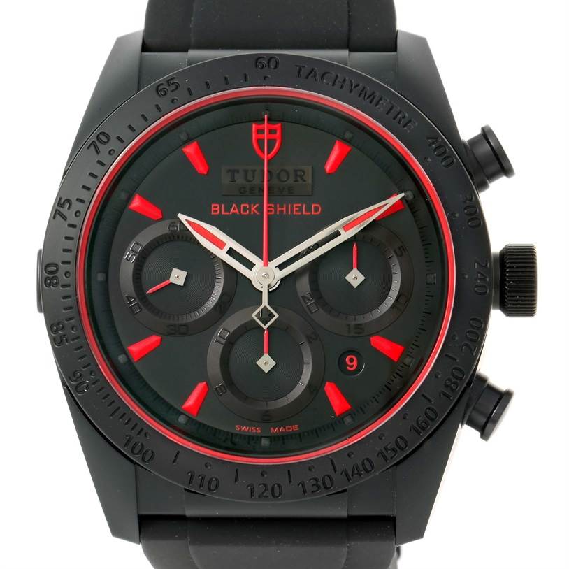 The image shows a front view of the Tudor Fastrider 42000CR Men's Stainless Steel Black Dial 42000CR Men's Stainless Steel Black Dial Black Shield watch, including the dial, bezel, and chronograph sub-dials.