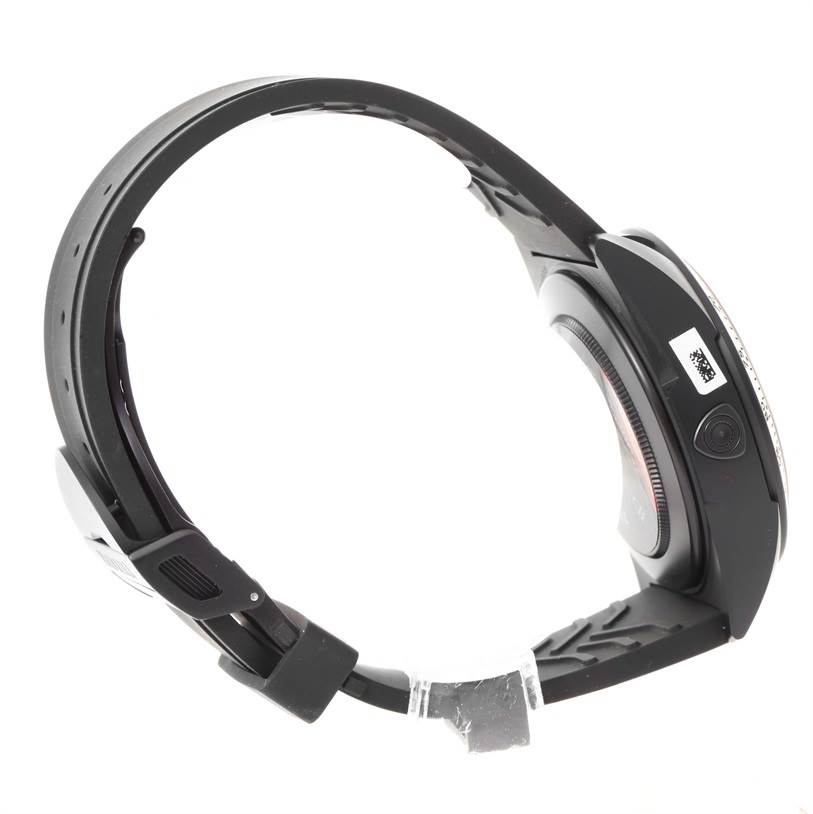 The Tudor Fastrider 42000CR Men's Stainless Steel Black Dial 42000CR Men's Stainless Steel Black Dial watch is shown from a side angle, highlighting its strap and casing.