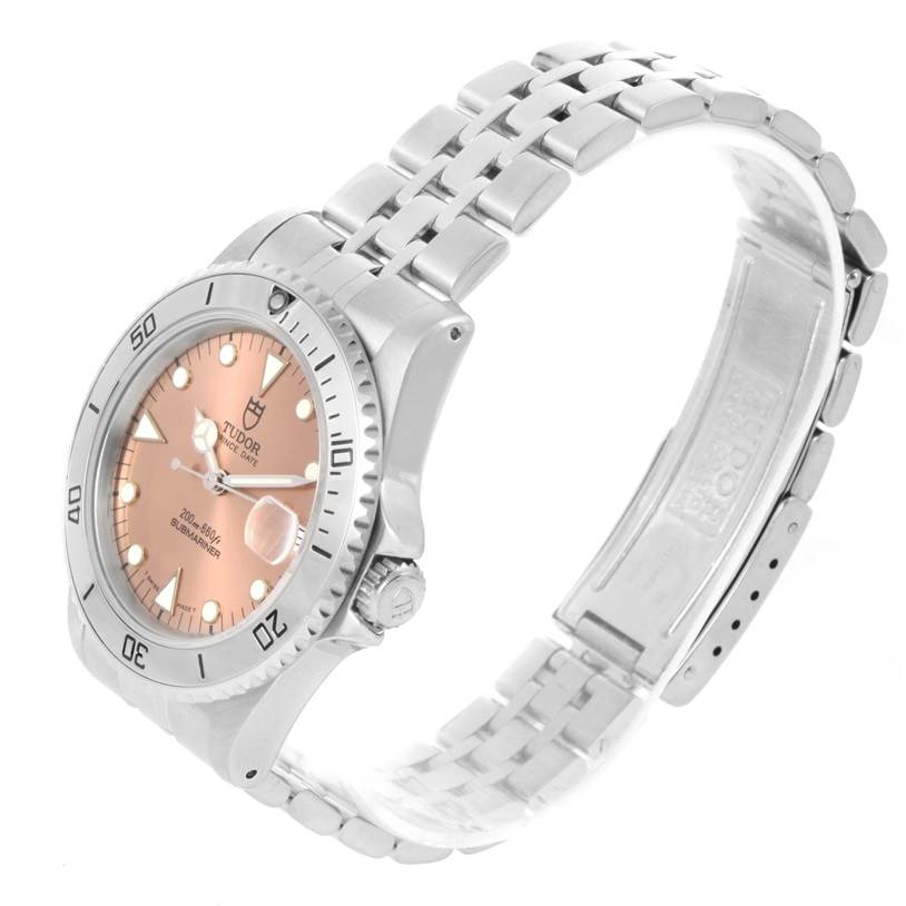 The Tudor Submariner 75190 Men's Stainless Steel Pink Dial 75190 Men's Stainless Steel Pink Dial watch is shown at a three-quarter angle, highlighting the dial, bezel, crown, and bracelet. 