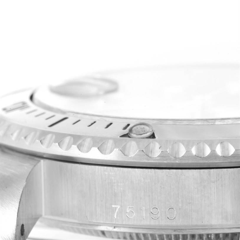 The image shows a close-up side angle of the Tudor Submariner 75190 Men's Stainless Steel Pink Dial 75190 Men's Stainless Steel Pink Dial watch model, focusing on the bezel, case, and part of the crystal.