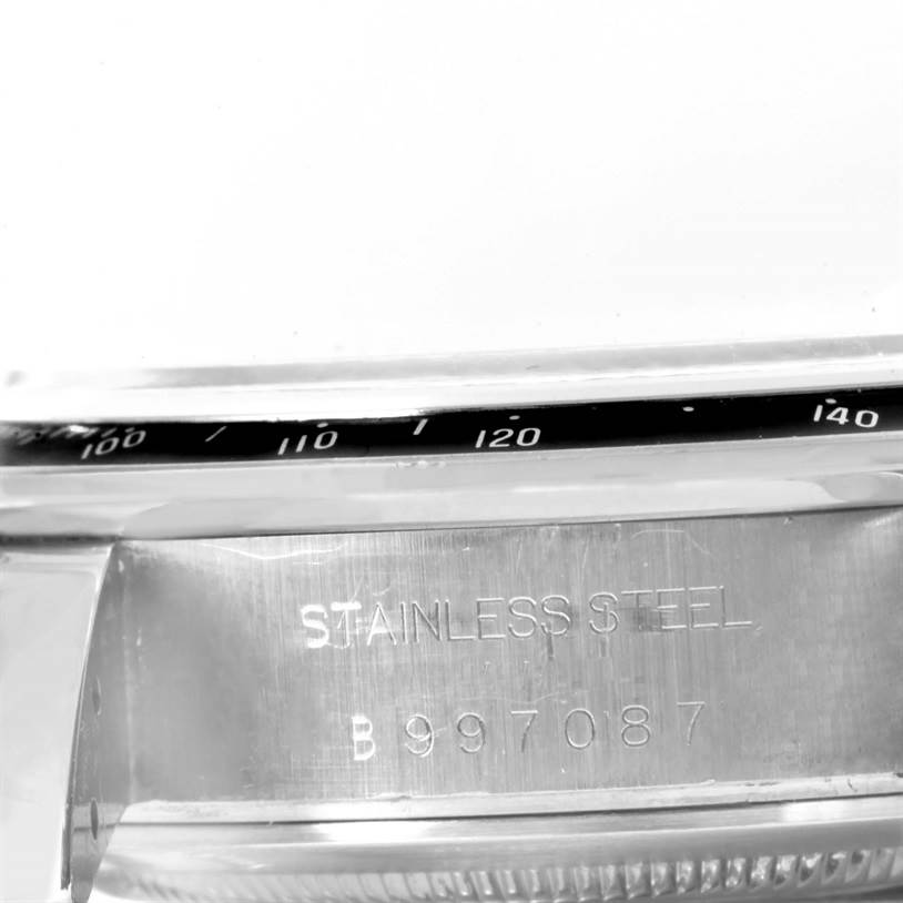 This image shows a close-up of the side and bezel of a Tudor Prince watch, with "STAINLESS STEEL" and a serial number engraved.