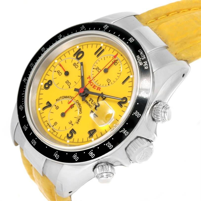 The Tudor Prince watch is shown from an angled close-up, highlighting its yellow dial, chronograph subdials, and bezel.