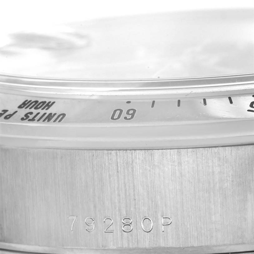 This image shows a close-up view of the side of the Tudor Tiger 79280 Men's Stainless Steel Burgundy Dial 79280 Men's Stainless Steel Burgundy Dial model watch, highlighting the bezel and the engraved model number 79280P.