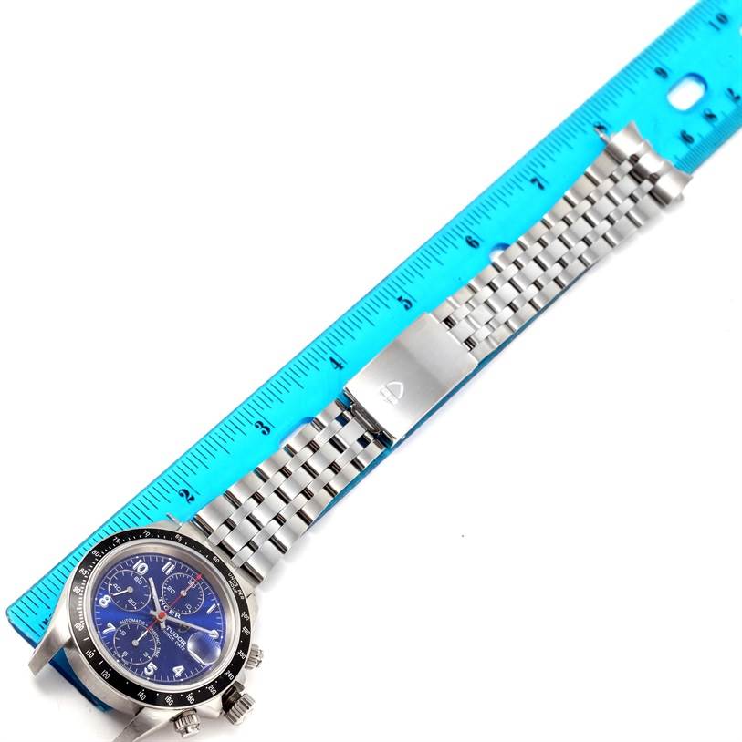 The image shows a Tudor Prince watch laid flat next to a blue ruler to indicate its length.