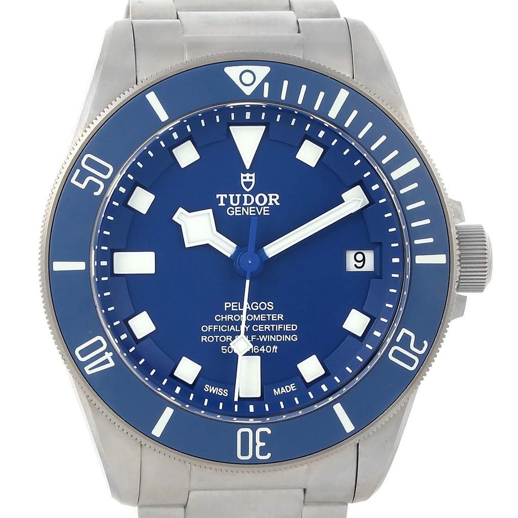 The image shows a front view of the Tudor Pelagos 25600TB Men's Titanium Blue Dial 25600TB Men's Titanium Blue Dial watch, highlighting its blue dial, bezel, and stainless steel bracelet.