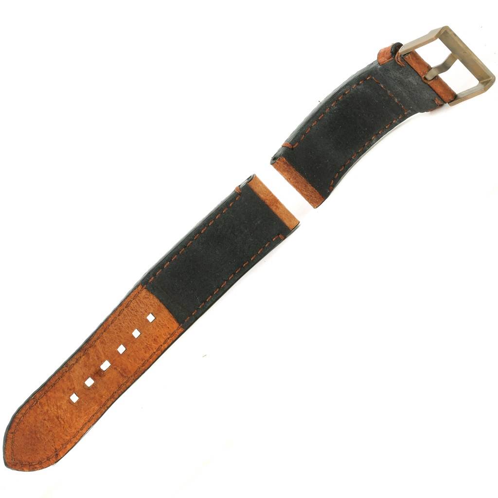 This image shows a detached black leather strap and buckle for the Tudor Heritage Black Bay 79250 Men's Bronze Brown Dial 79250 Men's Bronze Brown Dial watch.