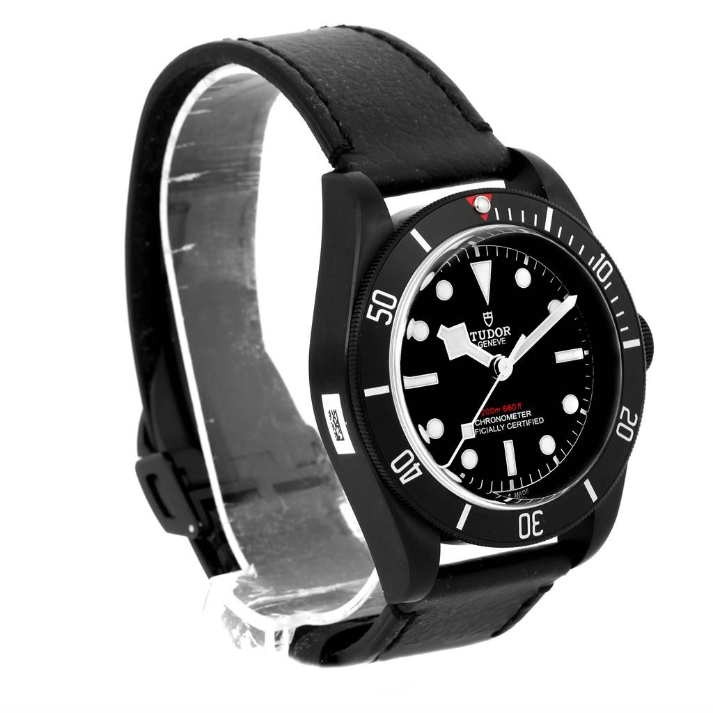 The image shows a Tudor Heritage Black Bay 79230DK Men's Stainless Steel Black Dial 79230DK Men's Stainless Steel Black Dial watch at a three-quarter angle, displaying the dial, bezel, and strap.