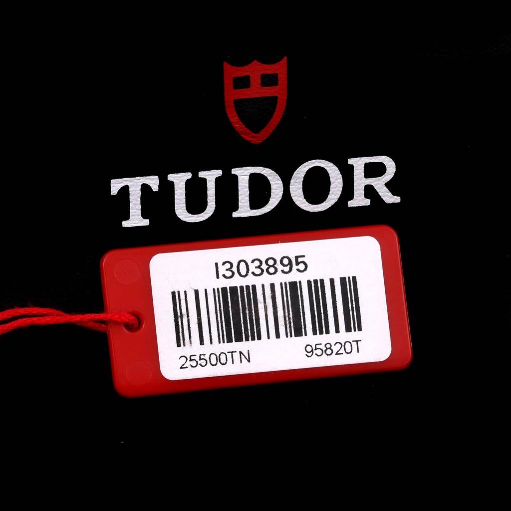 The image shows a barcode tag with model and serial numbers for a Tudor Pelagos 25500TN Men
s Titanium Black Dial 25500TN Men
s Titanium Black Dial watch.