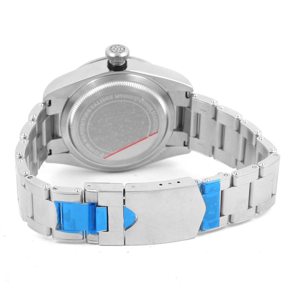 The image shows the backside and bracelet of a Tudor Heritage Black Bay 79230N Men's Stainless Steel Black Dial 79230N Men's Stainless Steel Black Dial watch, focusing on the clasp and case back.