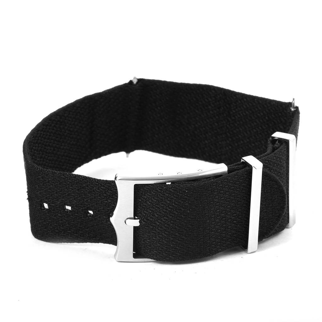 This image shows a black fabric strap and stainless steel buckle for a Tudor Heritage Black Bay 79230N Men's Stainless Steel Black Dial 79230N Men's Stainless Steel Black Dial watch.