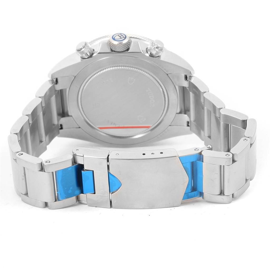 The image shows the back case, crown, and clasp of a Tudor Heritage Chrono 70330 Men's Stainless Steel Blue Dial 70330 Men's Stainless Steel Blue Dial watch from a rear angle.