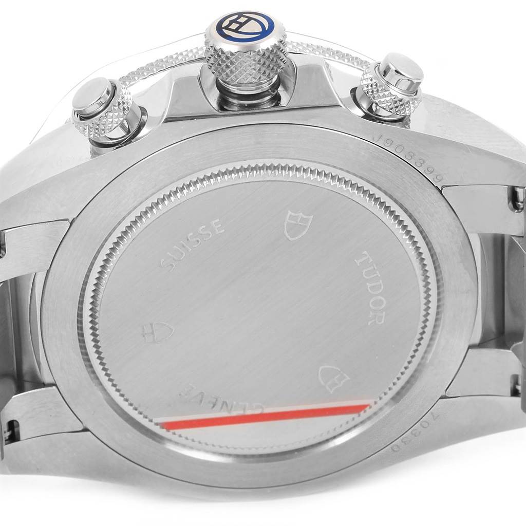 This image shows the case back and side view of the Heritage Chrono model by Tudor, featuring the crown and pushers.