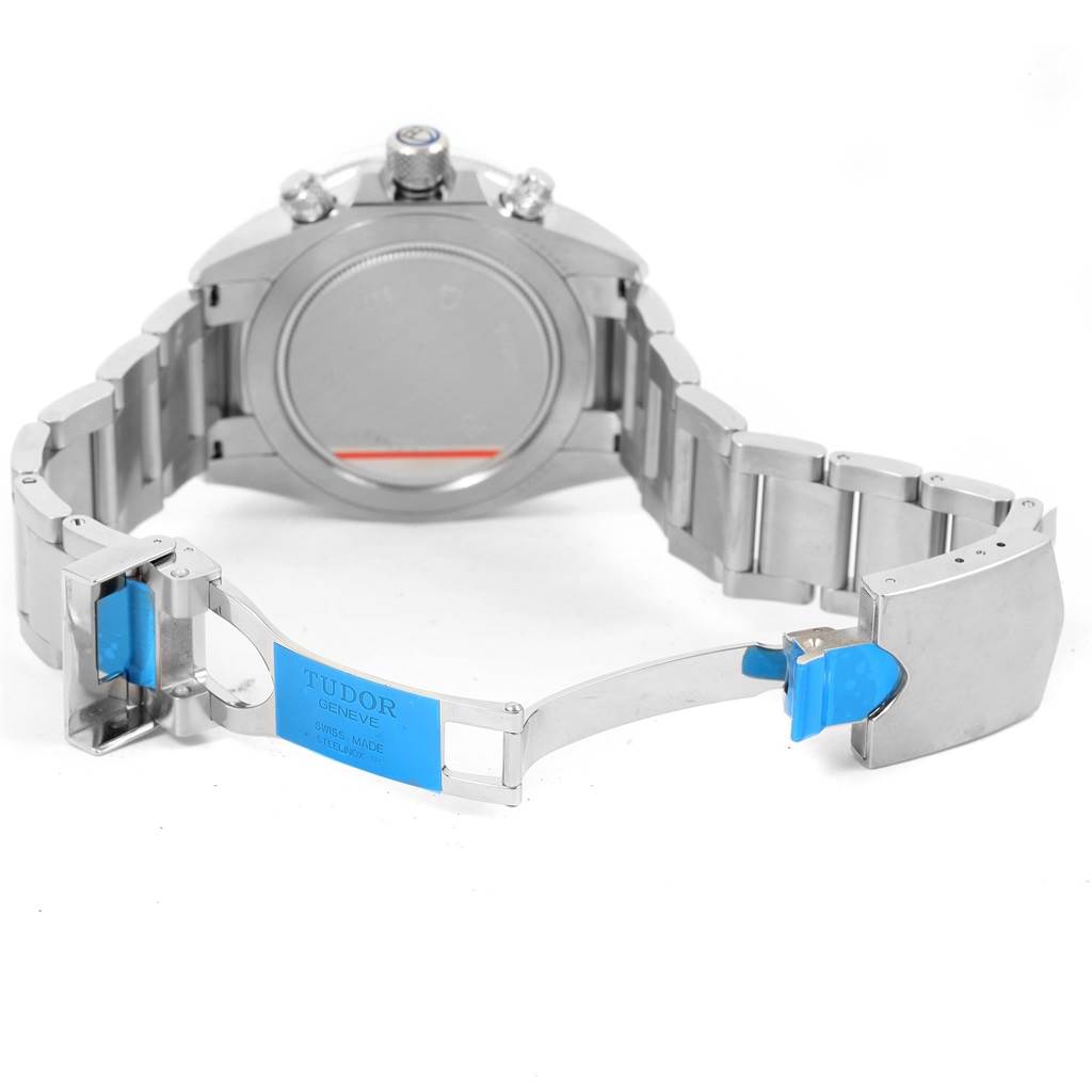 The image shows the back side and bracelet of the Tudor Heritage Chrono 70330 Men's Stainless Steel Blue Dial 70330 Men's Stainless Steel Blue Dial watch, with the clasp open and the case back visible.