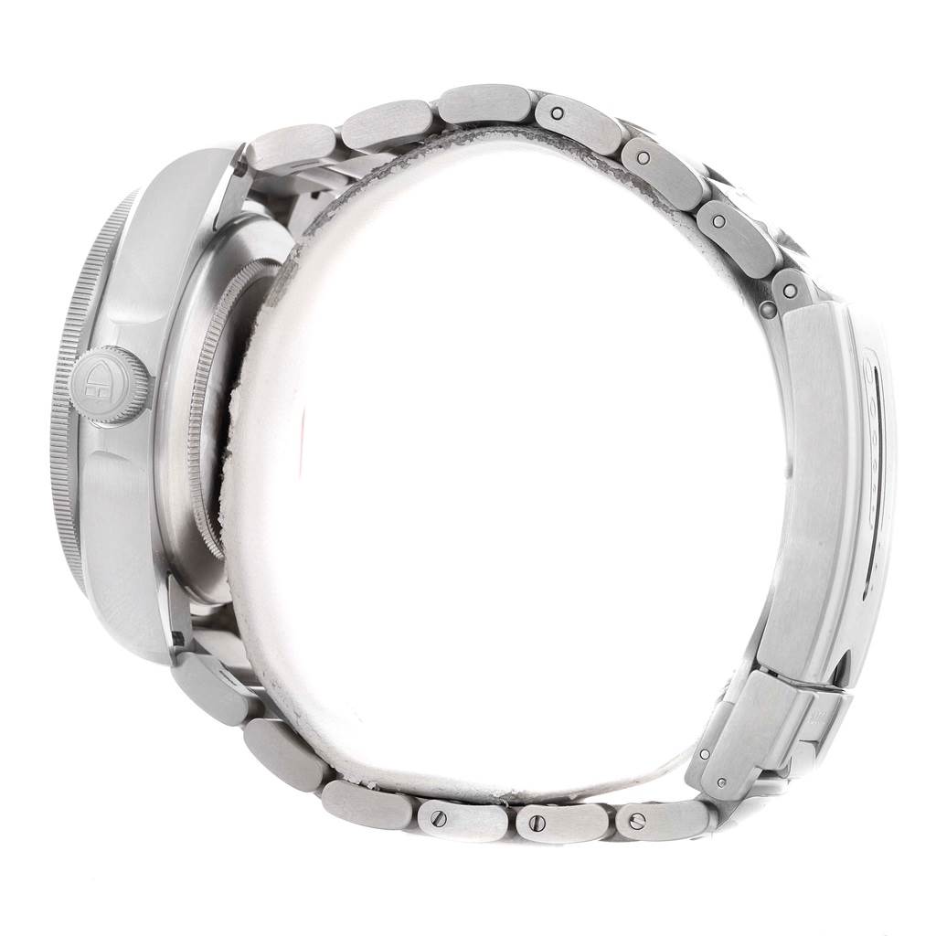 This side view of the Tudor Pelagos 25600TN Men's Titanium Black Dial 25600TN Men's Titanium Black Dial watch shows the crown, bezel, case, and metal bracelet.