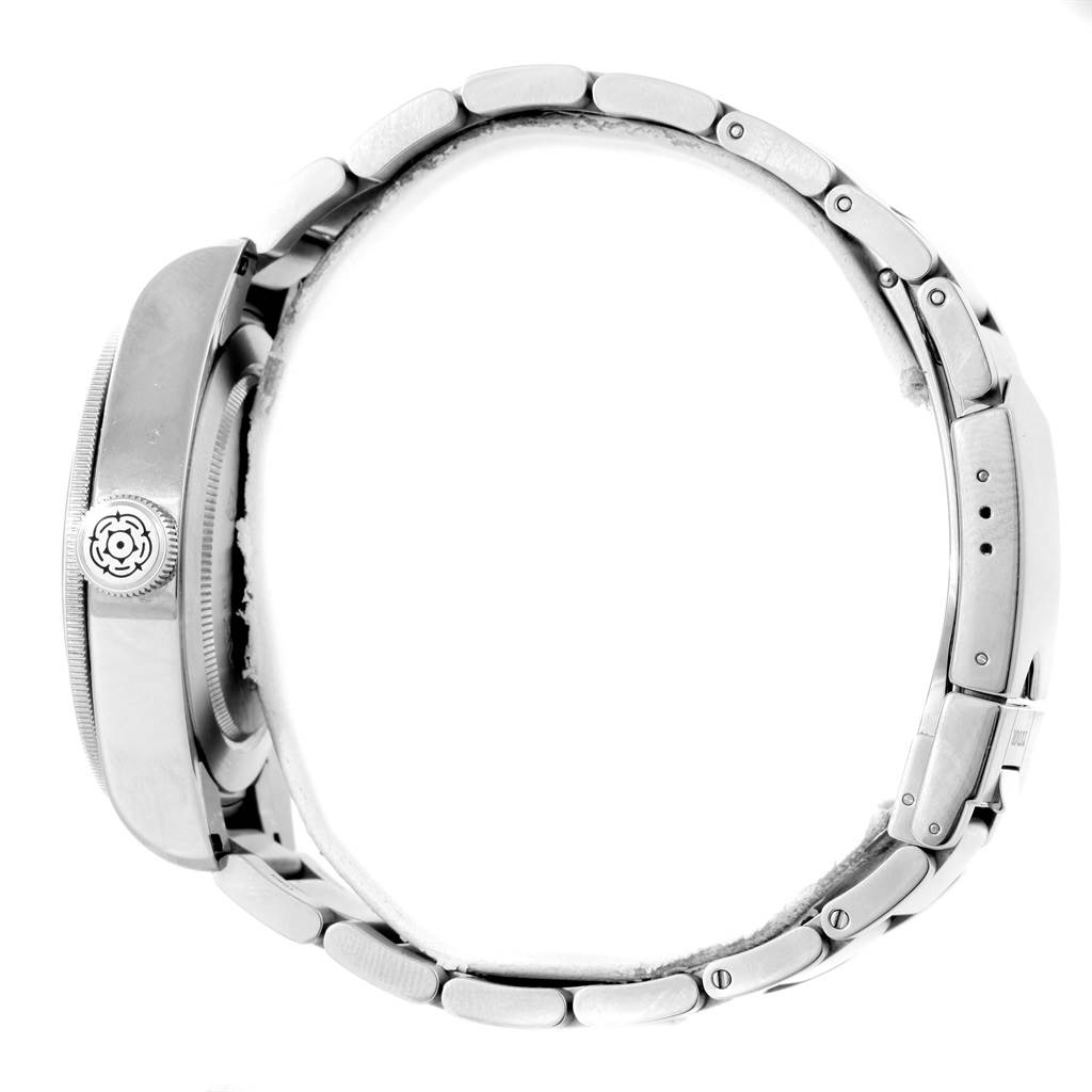 The image shows a side view of a Tudor Heritage Black Bay 79220R Men's Stainless Steel Black Dial 79220R Men's Stainless Steel Black Dial watch, highlighting the crown and bracelet.