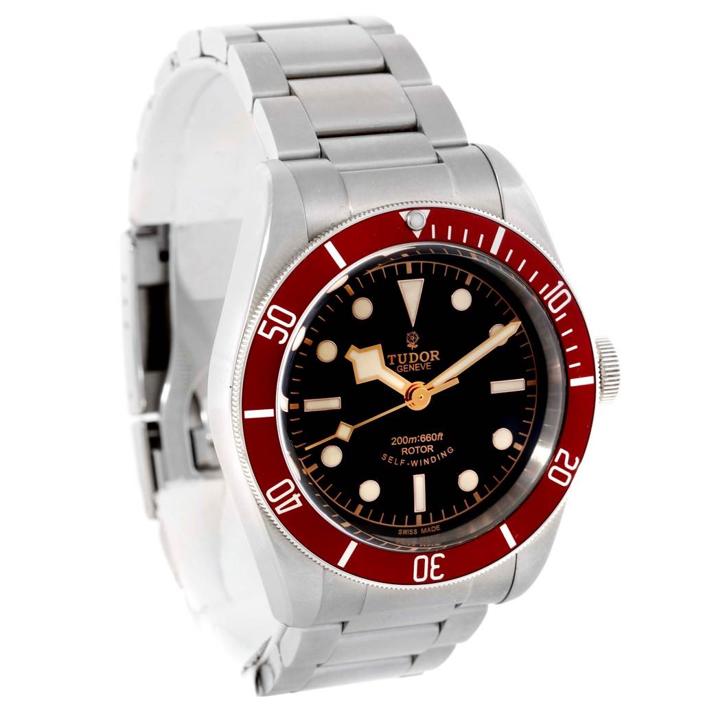 The image shows a Tudor Heritage Black Bay 79220R Men's Stainless Steel Black Dial 79220R Men's Stainless Steel Black Dial watch from an upper front angle, highlighting its face, bezel, crown, and bracelet.