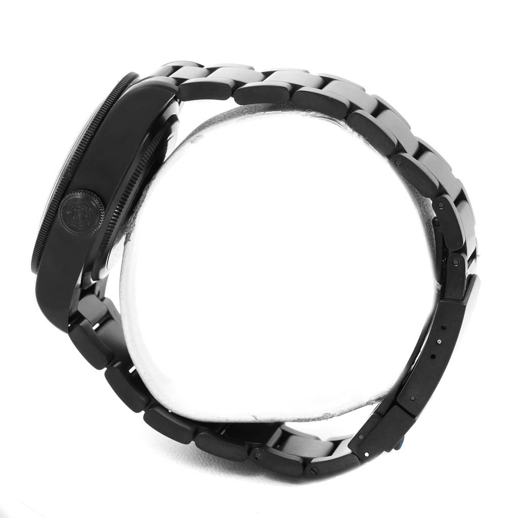 This is a side view of the Tudor Heritage Black Bay 79230DK Men
s Stainless Steel Black Dial 79230DK Men
s Stainless Steel Black Dial watch showcasing the case, crown, and metal bracelet.