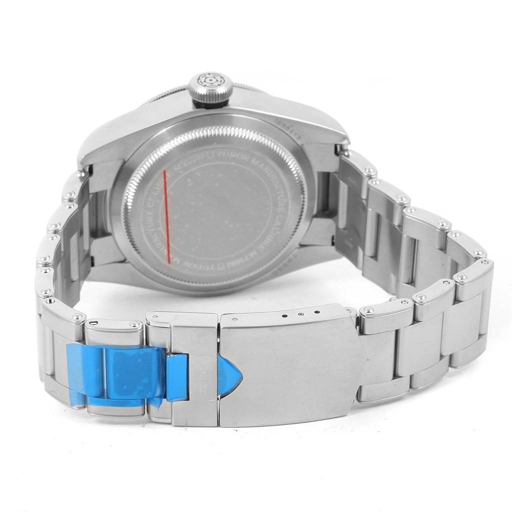 The image shows the back and clasp of a Tudor Heritage Black Bay 79230N Men's Stainless Steel Black Dial 79230N Men's Stainless Steel Black Dial watch with a silver metal bracelet.