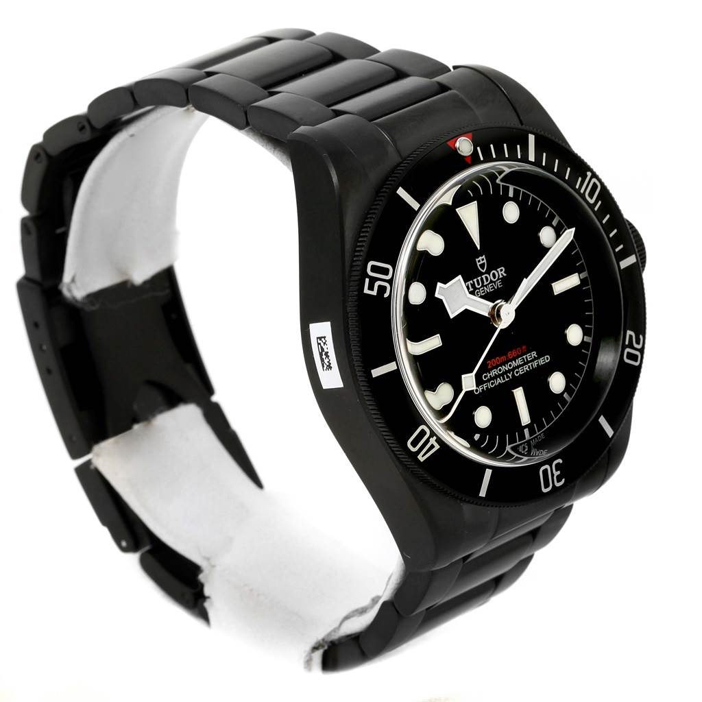 The image displays a side-angle view of a Tudor Heritage Black Bay 79230DK Men
s Stainless Steel Black Dial 79230DK Men
s Stainless Steel Black Dial watch, showing the watch face, bezel, and bracelet.