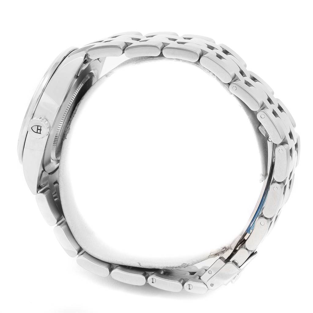 This image shows a side view of the Tudor Glamour 55020 Stainless Steel Black Dial 55020 Stainless Steel Black Dial model watch, focusing on the case and the metal bracelet.