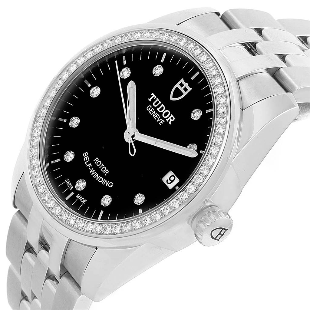 The image shows the face, bezel, and part of the bracelet of the Tudor Glamour 55020 Stainless Steel Black Dial 55020 Stainless Steel Black Dial model watch at a slight angle.