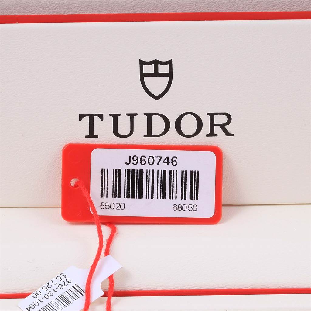 The image shows a price tag and logo for the Tudor Glamour 55020 Stainless Steel Black Dial 55020 Stainless Steel Black Dial model watch.