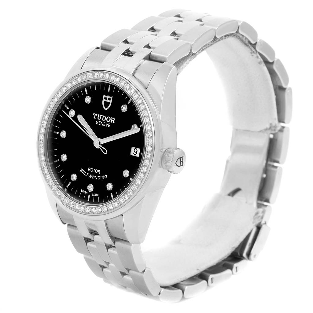 The image shows a Tudor Glamour 55020 Stainless Steel Black Dial 55020 Stainless Steel Black Dial model watch at a three-quarter angle, highlighting the dial, case, bezel, crown, and bracelet.